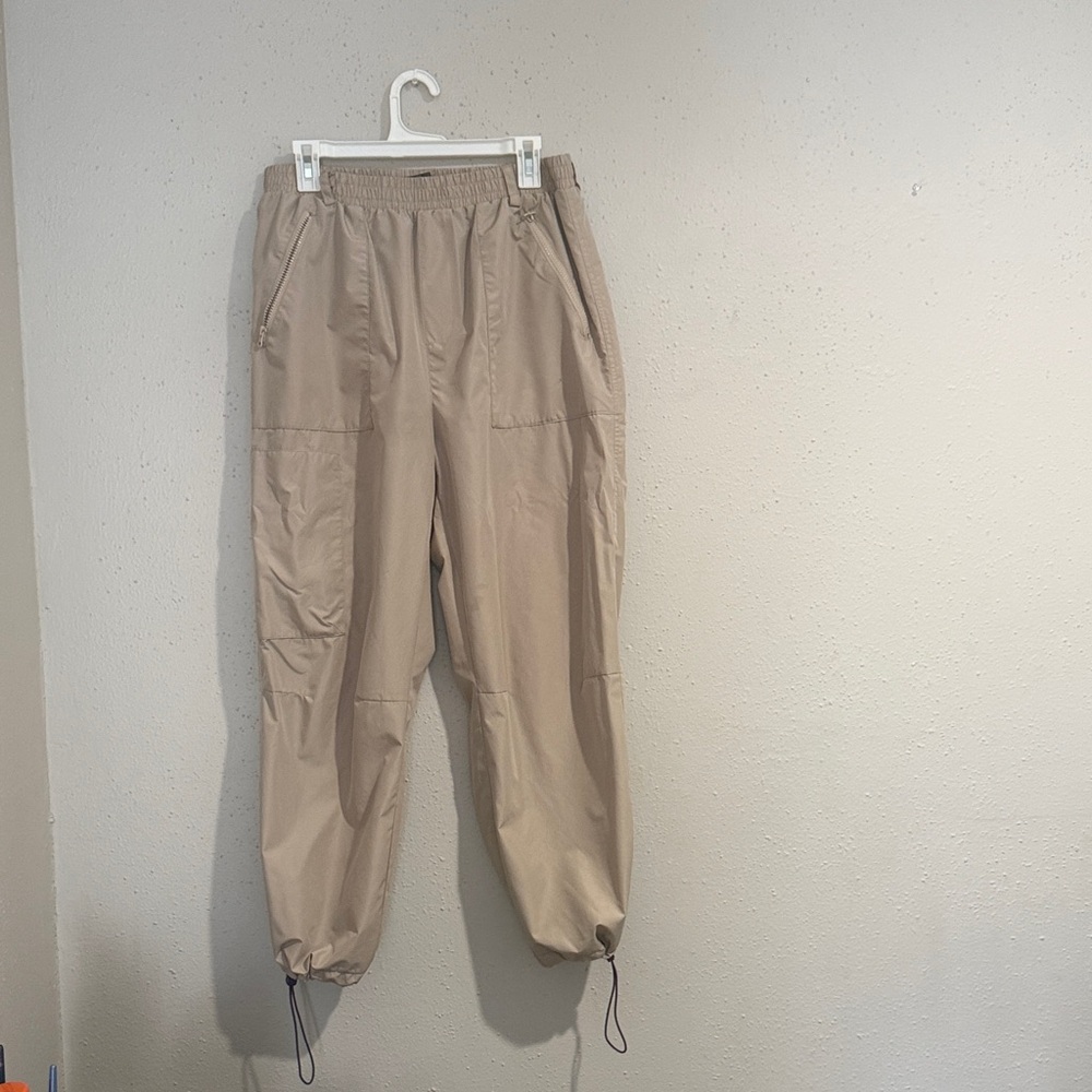 Women Tan Jogger Pants with purple drawstrings